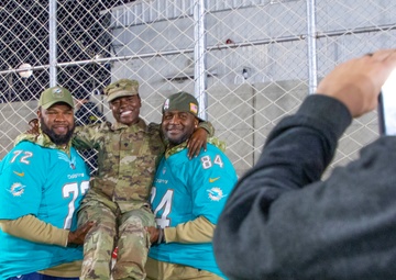Miami Dolphins spread holiday cheer to troops in Jordan