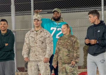 Miami Dolphins spread holiday cheer to troops in Jordan