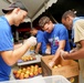 CSS-15 Sailors Serve Up Fresh Fruit to 5K Runners