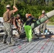 U.S. Navy Seabees from NMCB 5’s Detail Diego Garcia place concrete in support of the U.S. Air Force