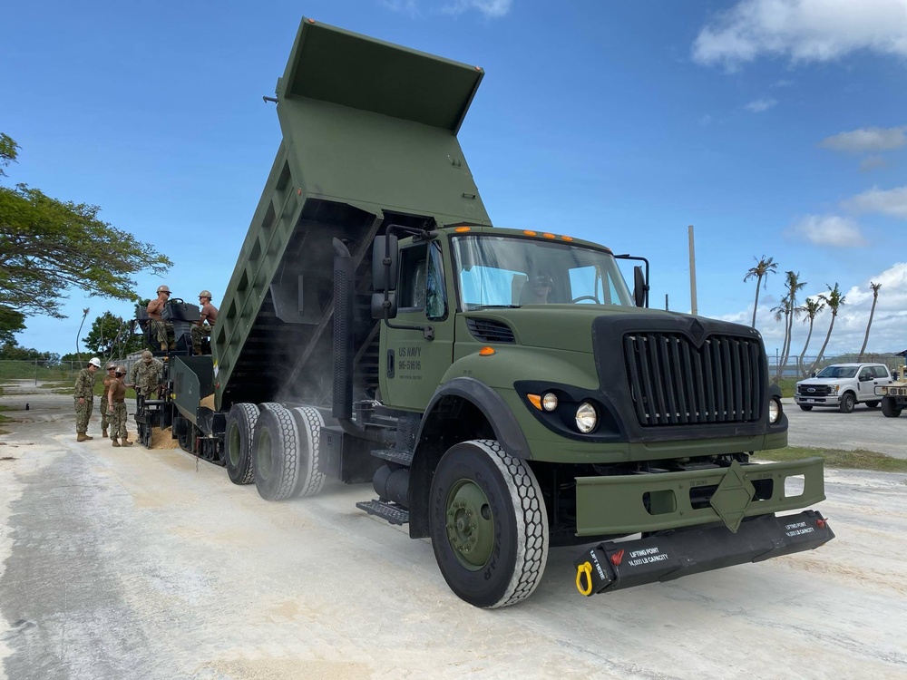 Seabees deployed with NMCB-5’s Detail Guam train on asphalt paving