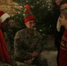 Area Support Group Soldiers bring holiday cheer to local children