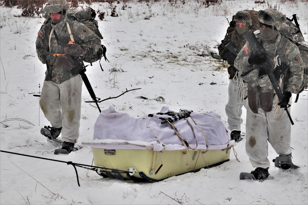 Fort McCoy Cold-Weather Operations Course students practice snowshoeing, conduct field ops