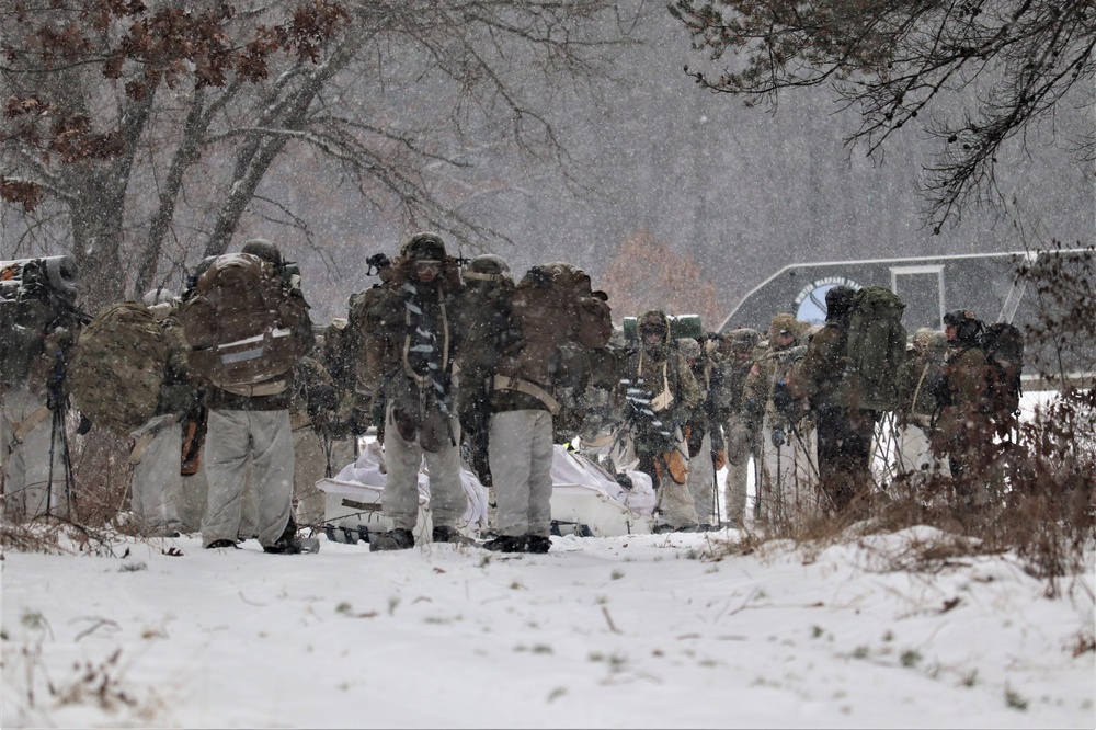 Fort McCoy Cold-Weather Operations Course students practice snowshoeing, conduct field ops