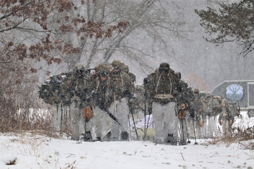 Fort McCoy Cold-Weather Operations Course students practice snowshoeing, conduct field ops
