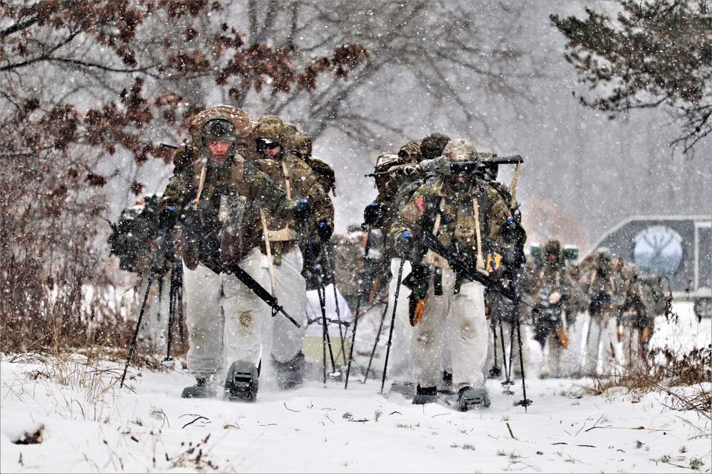 Fort McCoy Cold-Weather Operations Course students practice snowshoeing, conduct field ops