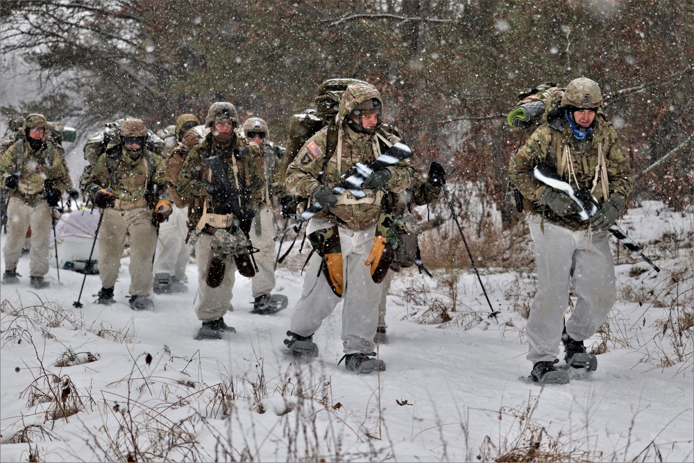 Fort McCoy Cold-Weather Operations Course students practice snowshoeing, conduct field ops