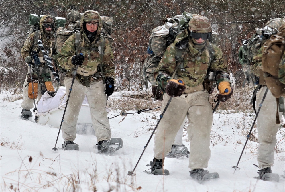 Fort McCoy Cold-Weather Operations Course students practice snowshoeing, conduct field ops