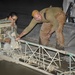 370th AEAS Air Advisors facilitate runway repairs at Taji