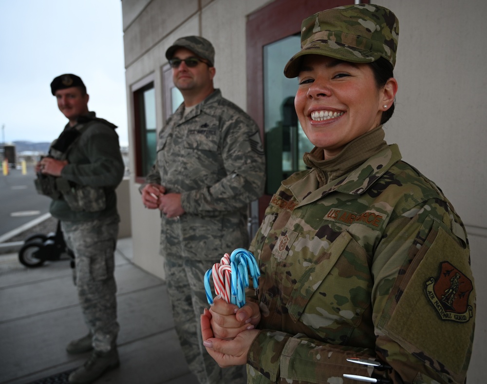 173rd Fighter Wing 1st Sergeants wish Airmen ‘Happy Holidays” at the main gate