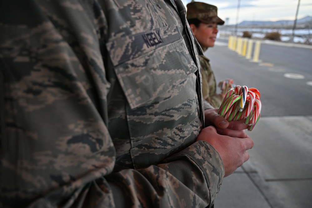 173rd Fighter Wing 1st Sergeants wish Airmen ‘Happy Holidays” at the main gate