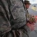 173rd Fighter Wing 1st Sergeants wish Airmen ‘Happy Holidays” at the main gate