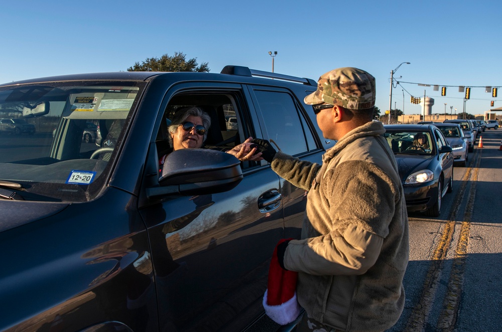 Volunteers show commuters ‘We Care’ at JBSA-Lackland entry gates