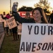 Volunteers show commuters ‘We Care’ at JBSA-Lackland entry gates