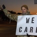 Volunteers show commuters ‘We Care’ at JBSA-Lackland entry gates