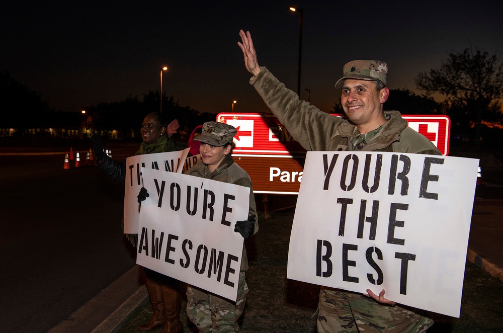 Volunteers show commuters ‘We Care’ at JBSA-Lackland entry gates