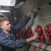 GHWB Sailor Performs Engine Check