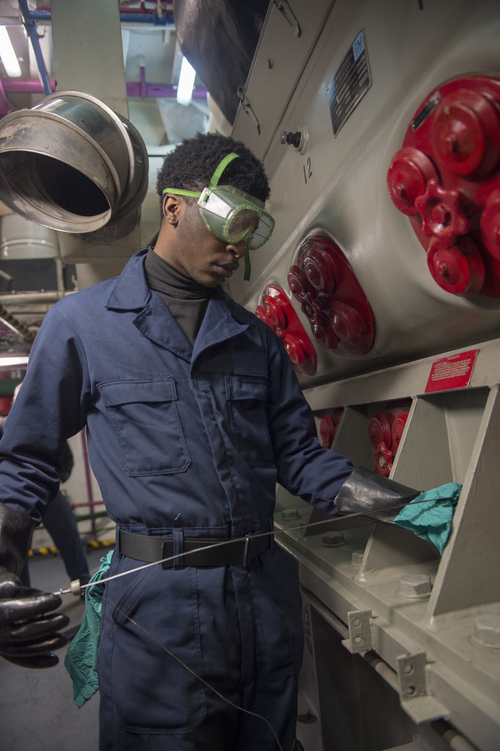 GHWB Sailor Performs Engine Check
