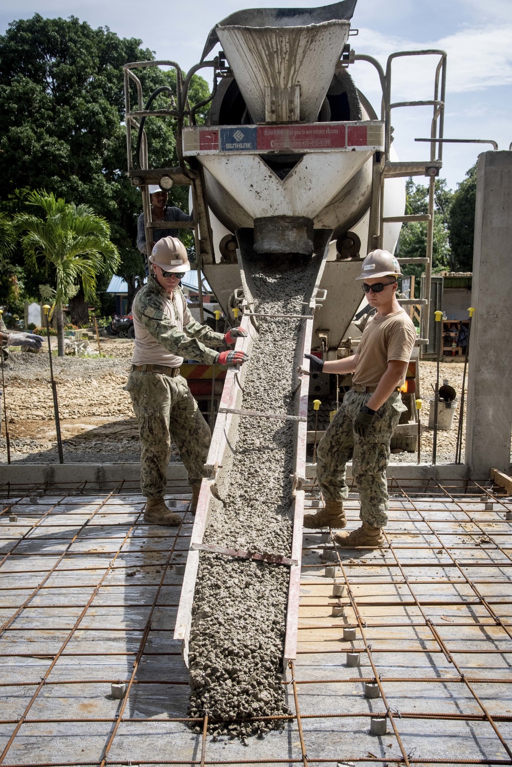 U.S. Navy Seabees deployed with NMCB-5’s Detail Palawan continue construction on Malatgao Elementary School