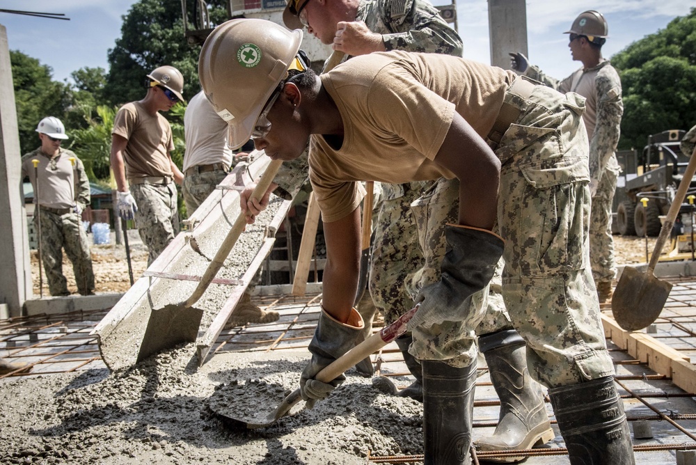 U.S. Navy Seabees deployed with NMCB-5’s Detail Palawan continue construction on Malatgao Elementary School