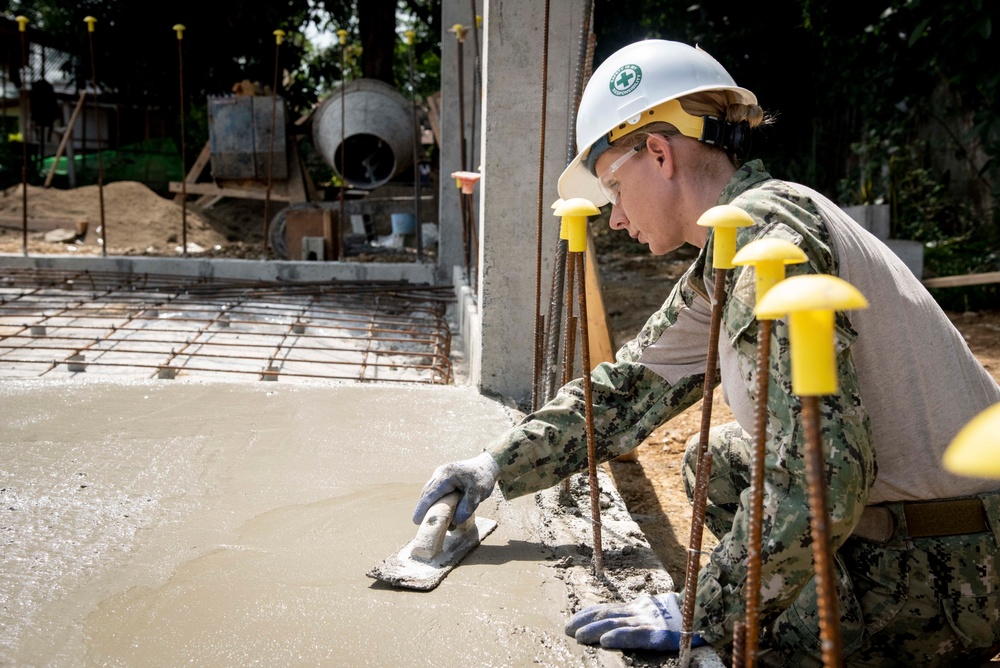 U.S. Navy Seabees deployed with NMCB-5’s Detail Palawan continue construction on Malatgao Elementary School