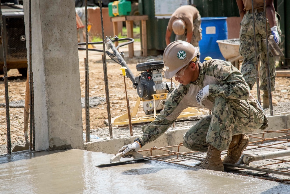 U.S. Navy Seabees deployed with NMCB-5’s Detail Palawan continue construction on Malatgao Elementary School