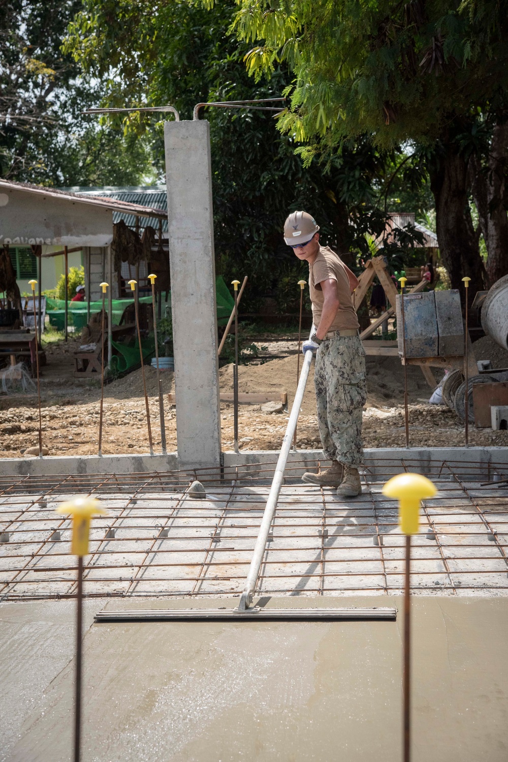 U.S. Navy Seabees deployed with NMCB-5’s Detail Palawan continue construction on Malatgao Elementary School