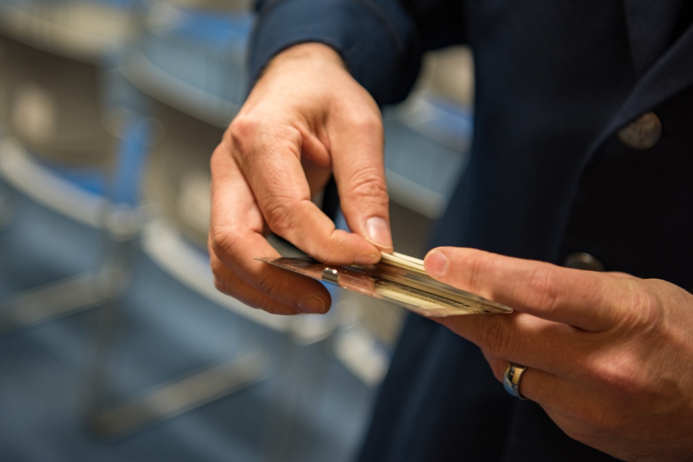 374th MXG donates books to local library