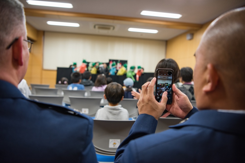 374th MXG donates books to local library