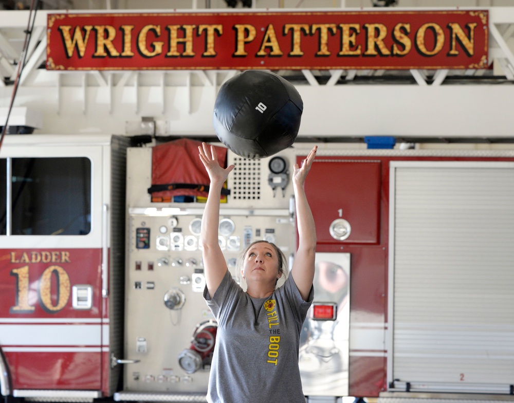 Wright-Patt firefighters learn peer fitness training