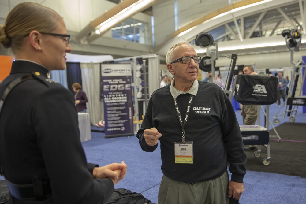 Marines engage with coaches at the American Volleyball Coaches Association 2019 National Convention