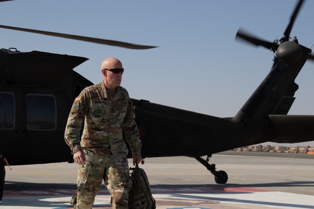 U.S. Army Lt. Gen. Charles D. Luckey deplanes a UH-60 Black Hawk