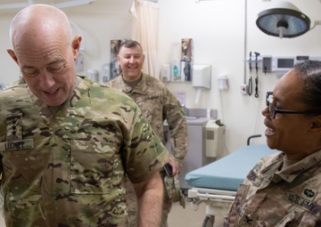 Lt. Gen. Charles D. Luckey is presented with a unit T-shirt