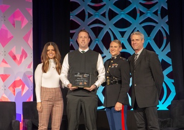 Marines present awards at the Jostens Coaches Honor Luncheon