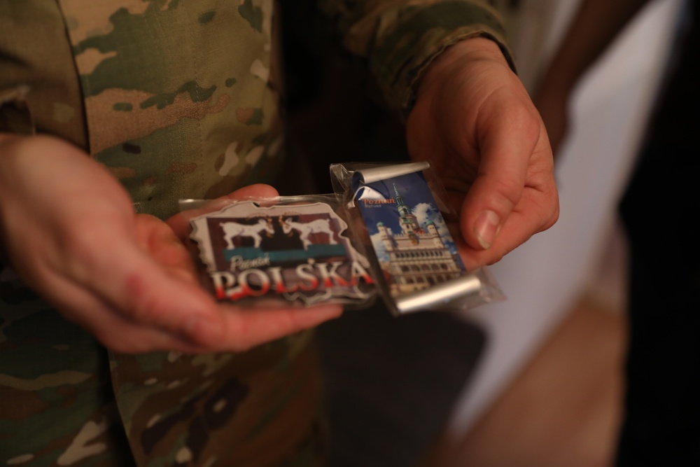 1 ID (FWD) Soldiers deliver Christmas gifts to local family