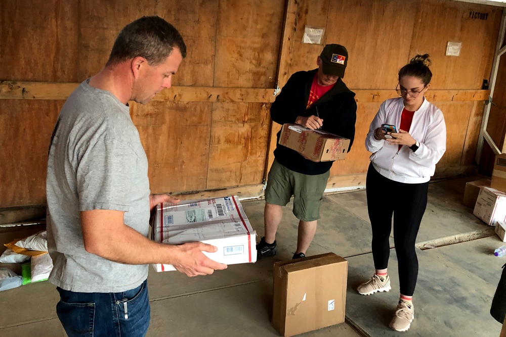 30th Armored Brigade Combat Team mail clerks distribute connections from home