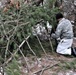 Cold-Weather Operations Course students build improvised shelters, survive outdoors