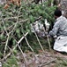 Cold-Weather Operations Course students build improvised shelters, survive outdoors