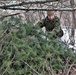 Cold-Weather Operations Course students build improvised shelters, survive outdoors