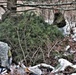 Cold-Weather Operations Course students build improvised shelters, survive outdoors