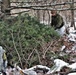 Cold-Weather Operations Course students build improvised shelters, survive outdoors