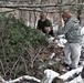 Cold-Weather Operations Course students build improvised shelters, survive outdoors