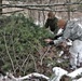 Cold-Weather Operations Course students build improvised shelters, survive outdoors
