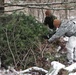 Cold-Weather Operations Course students build improvised shelters, survive outdoors