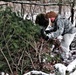 Cold-Weather Operations Course students build improvised shelters, survive outdoors