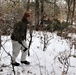 Cold-Weather Operations Course students build improvised shelters, survive outdoors