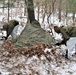 Cold-Weather Operations Course students build improvised shelters, survive outdoors