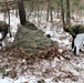 Cold-Weather Operations Course students build improvised shelters, survive outdoors