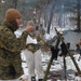 Cold-Weather Operations Course students build improvised shelters, survive outdoors