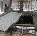 Cold-Weather Operations Course students build improvised shelters, survive outdoors